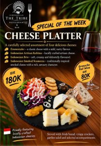 The Tribe Tulamben cheese platter with four Indonesian cheeses, bread, crackers and garden salad
