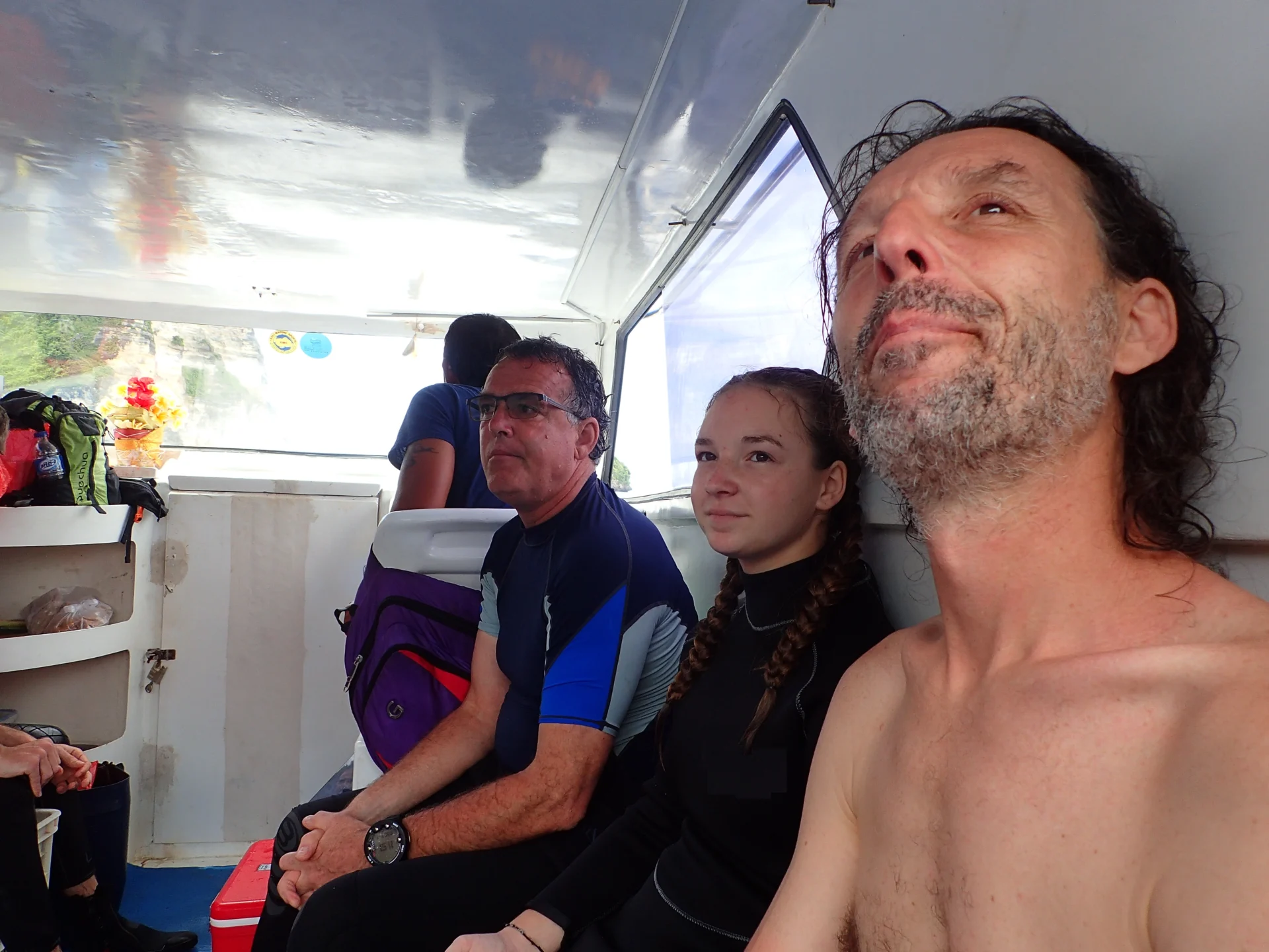 Group of divers sharing a boat trip in Bali