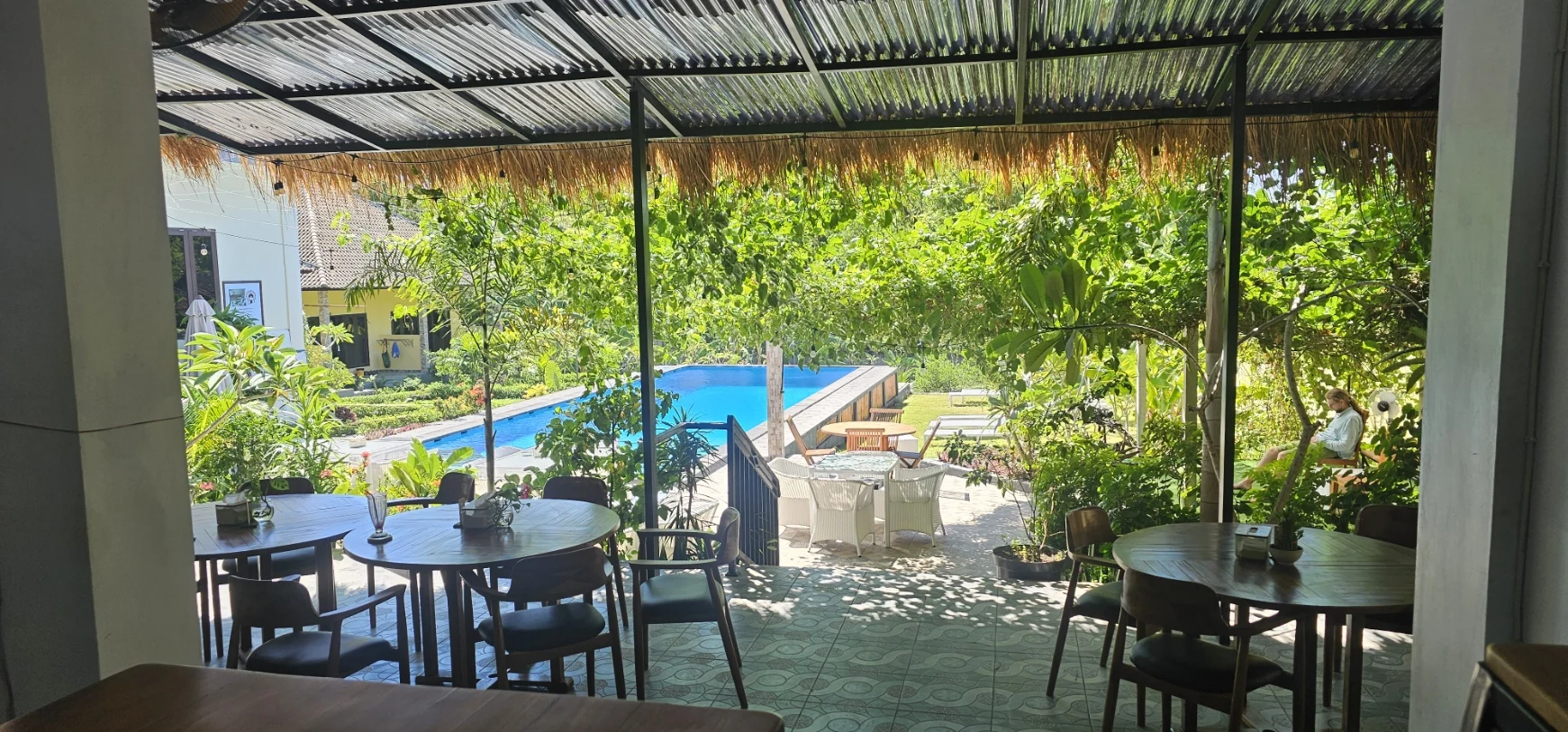 The Tribe's open dining room overlooking the terrace and pool