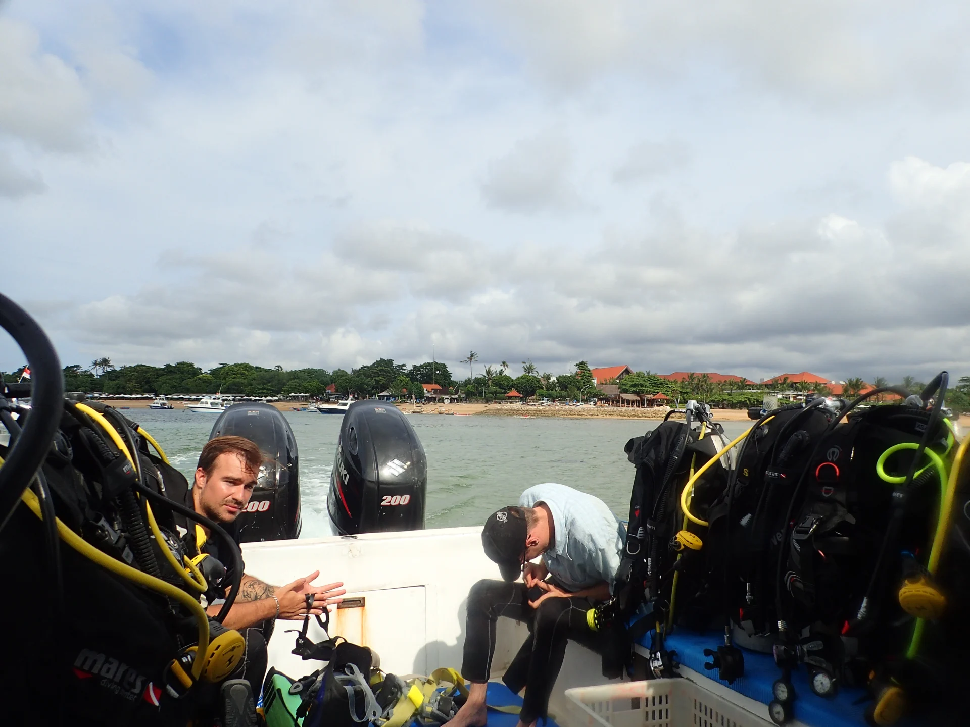 Divers and equipment aboard the boat