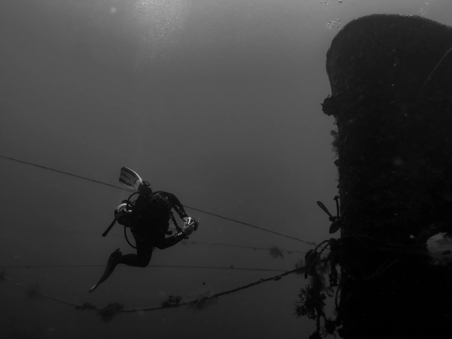 Diver along the wreck in Kubu, Bali