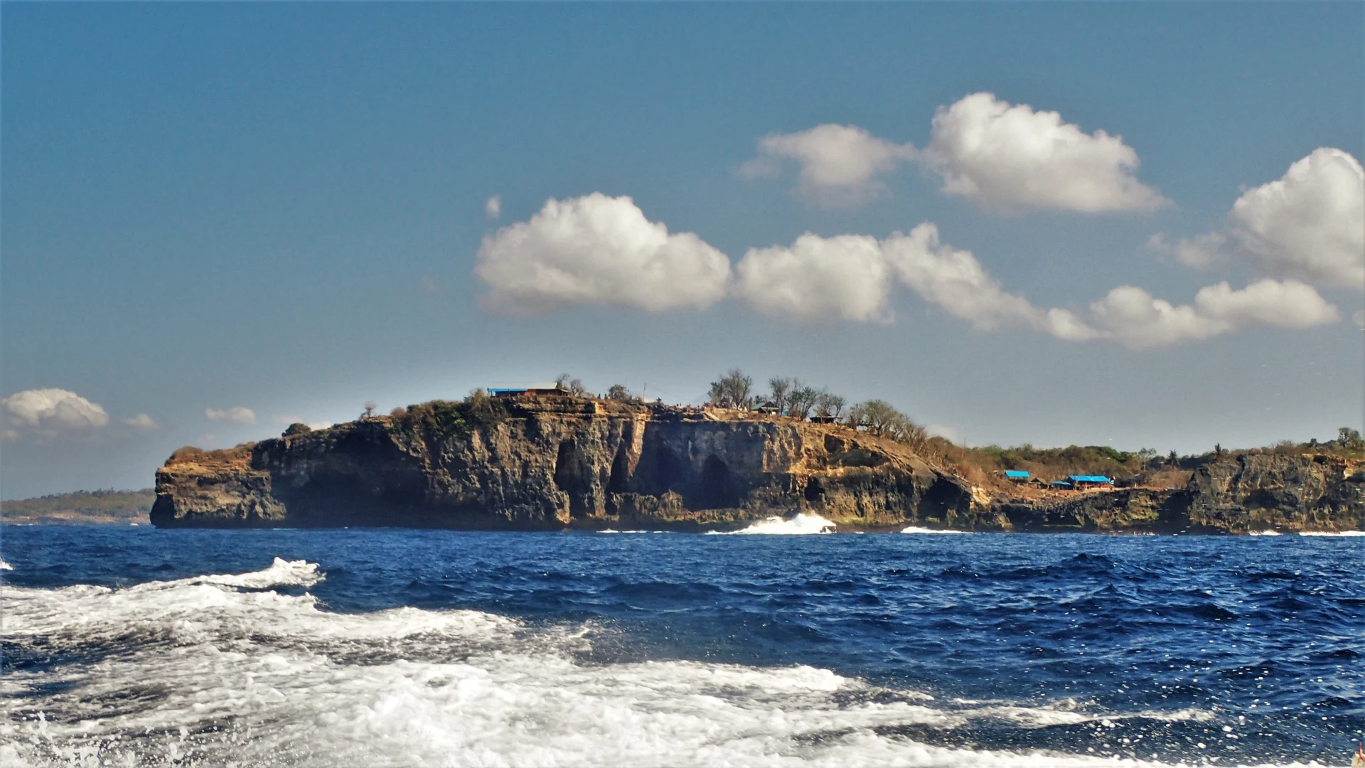 Rocky coastal landscape viewed from the boat