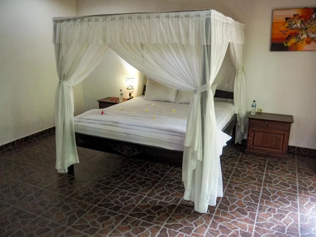 Another angle of the Standard Room with four-poster bed