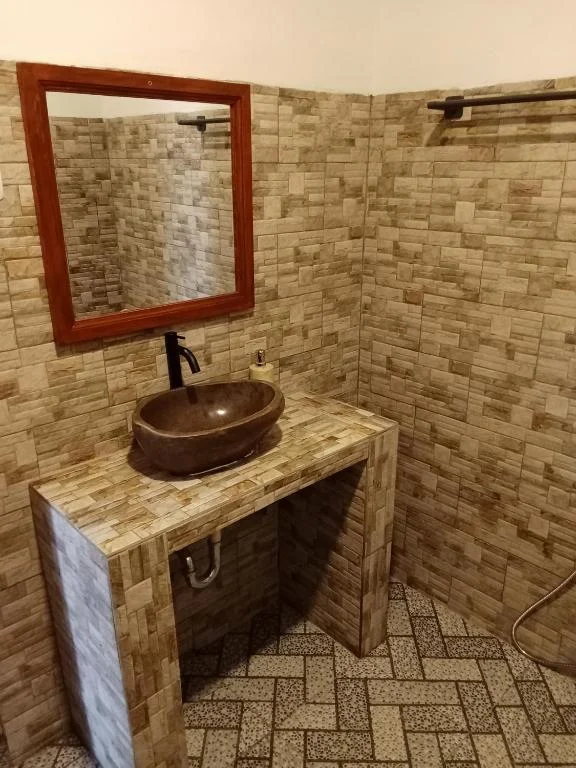 Washbasin in the Poolview Deluxe bathroom