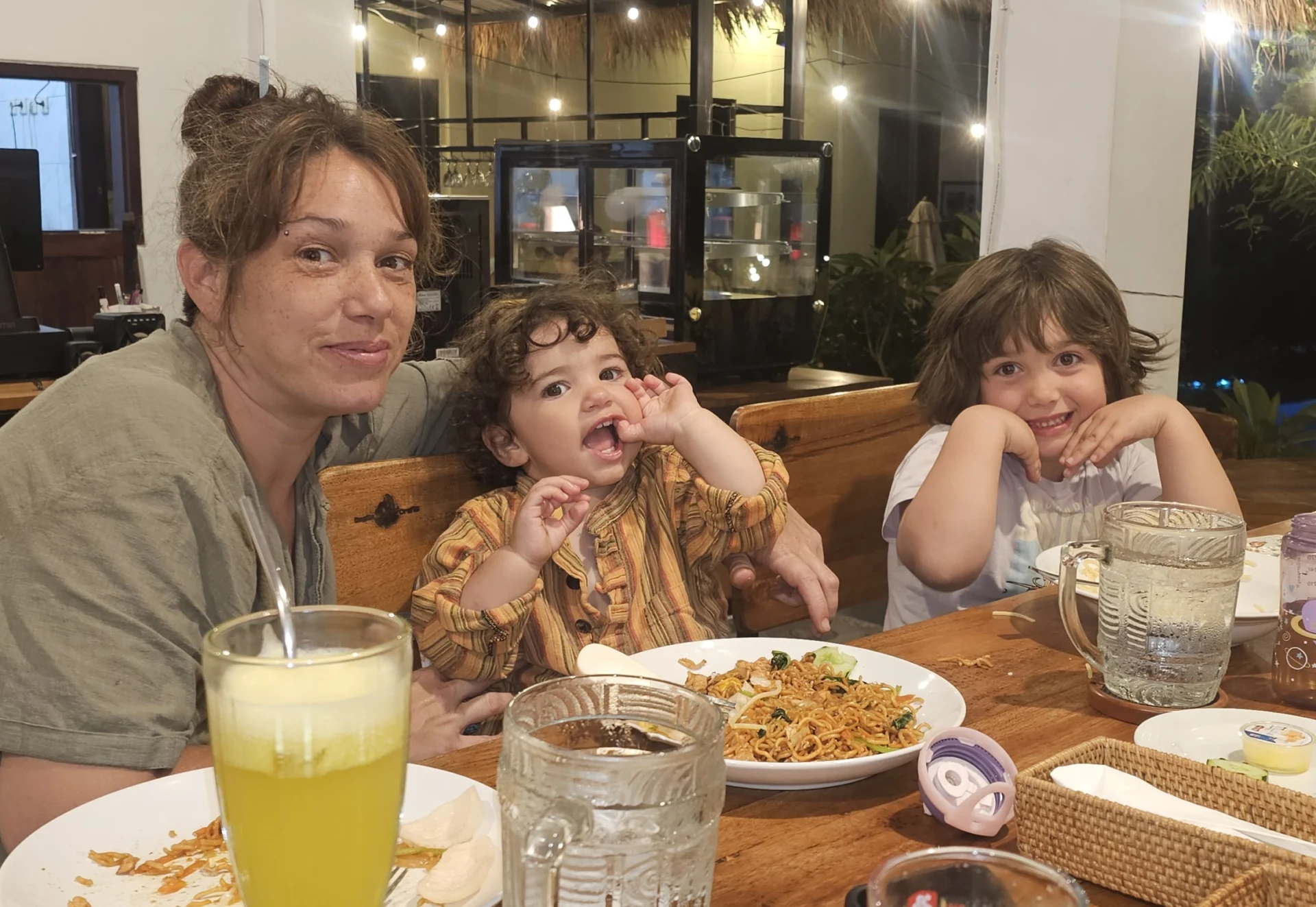 A meal shared around a table at The Tribe