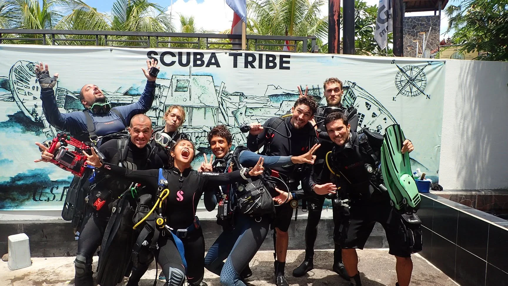 Divers in equipment outside the Scuba Tribe dive centre