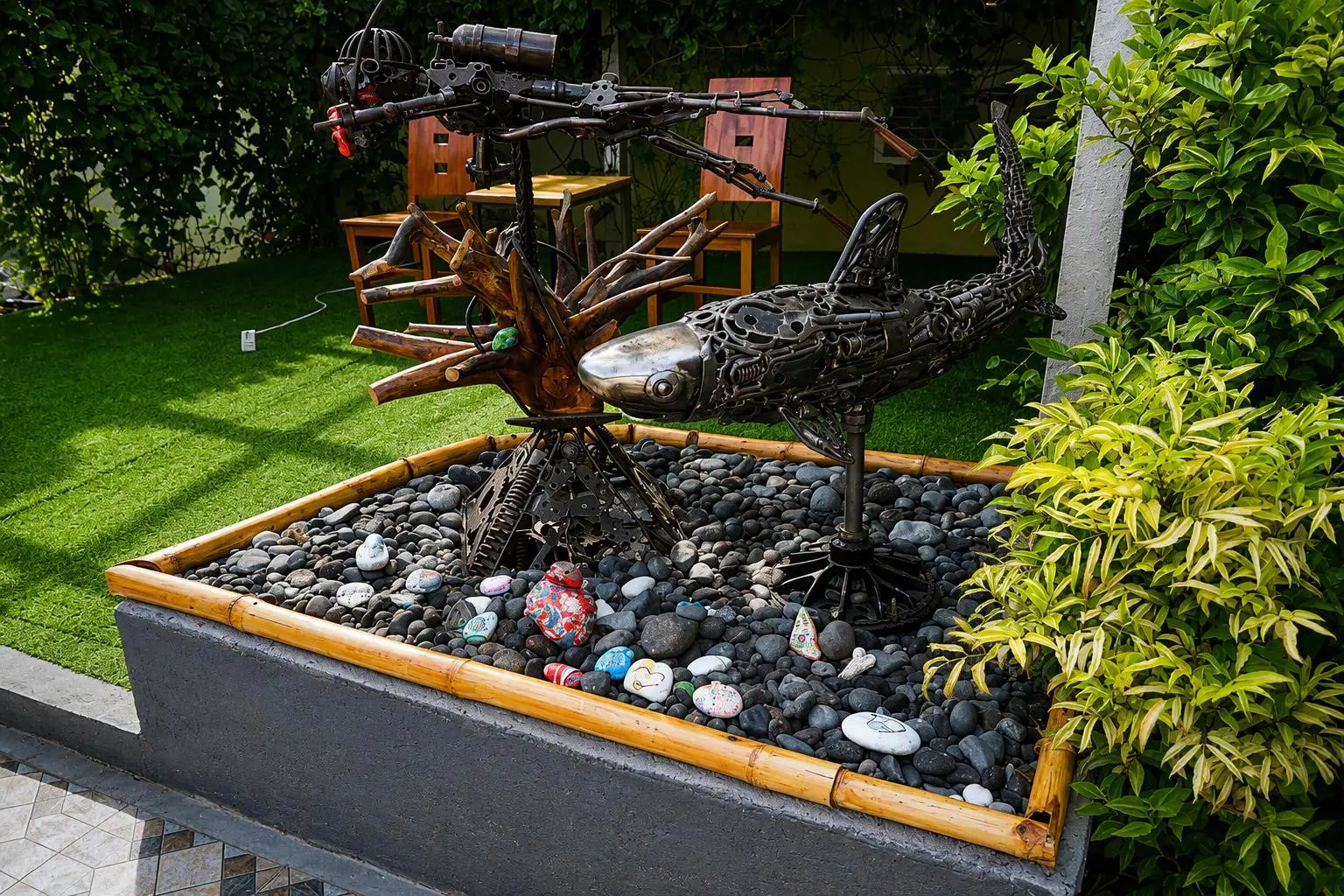 Metal shark sculpture in the garden