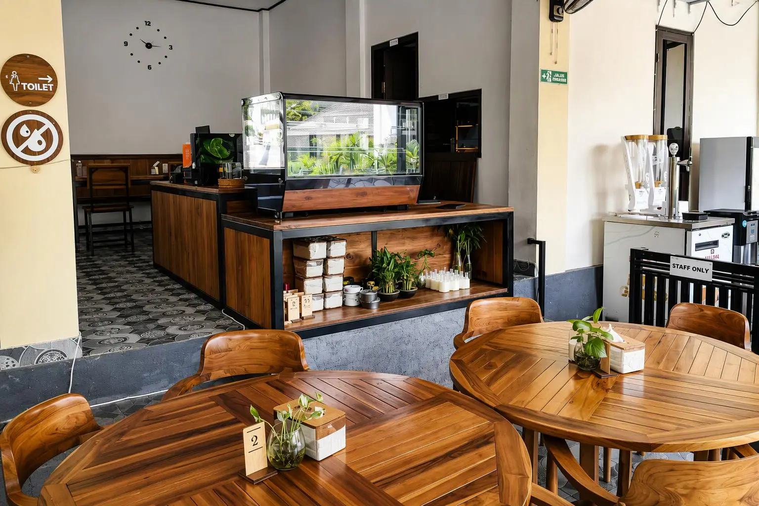 Wooden tables and display cabinet in the restaurant