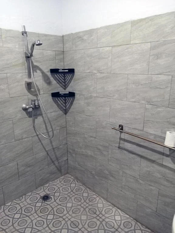 Shower in the Standard Room bathroom
